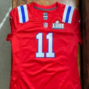 BRAND NEW. NEVER WORN. Women’s Patriots jersey. Number 11 Julian Edelman
